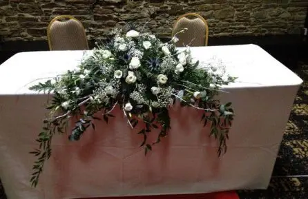 Winter Wedding Eryngium and white flowers Top Table Arrangement