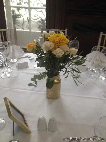 Gold Kilner Jars with Just Picked Wild Garden Flowers as Table Centrepieces - Crysanthemums, Roses, Eryngium and Eucalyptus at Aloft Hotel