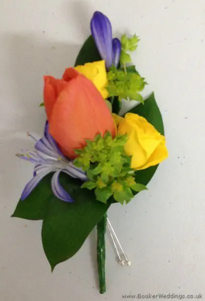 Brightly Coloured Pin Corsage with Tulip, Agapanthus & Spray Roses in Primary Colours