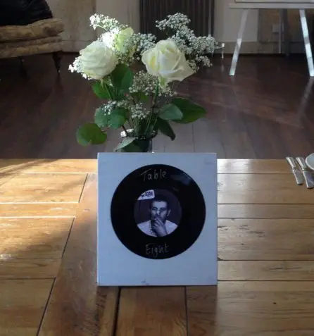 Jar Table Arangments Rose Eryngium and Gypsophilia  8