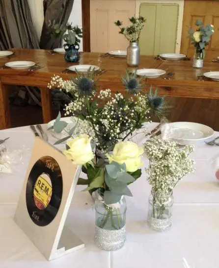 Jar Table Arangments Rose Eryngium and Gypsophilia 3