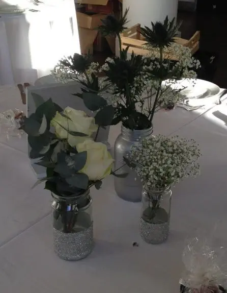 Jar Table Arangments Rose Eryngium and Gypsophilia 4