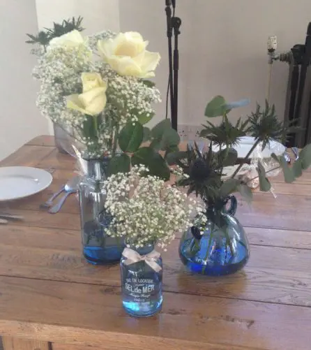 Jar Table Arangments Rose Eryngium and Gypsophilia 7