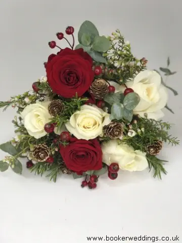 Rose Handtied in Red and White with Berries and Mini Pinecones