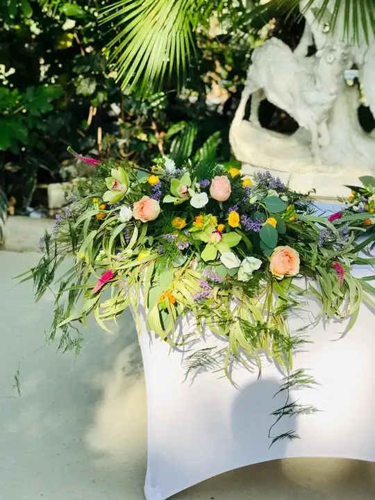 Wild and Flowy Top Table Palm House Wedding Fair