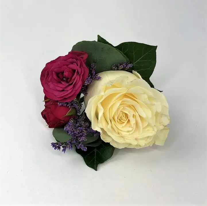 Vibrant Pink and White Rose Buttonhole for Groom