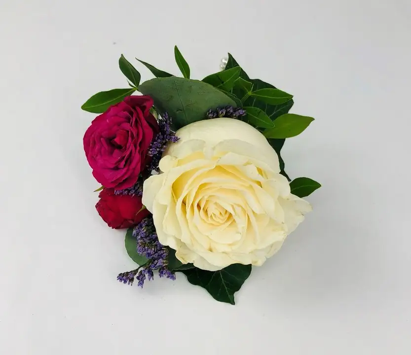 White Rose Boutonniere with Pink Spray Rose and Lilac