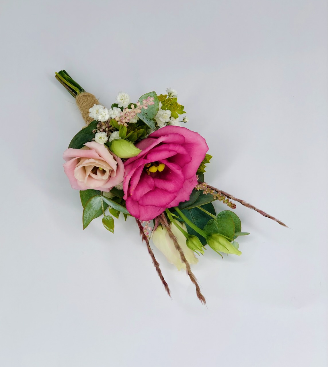 Fun and Bright Pink Grooms Boutonierre