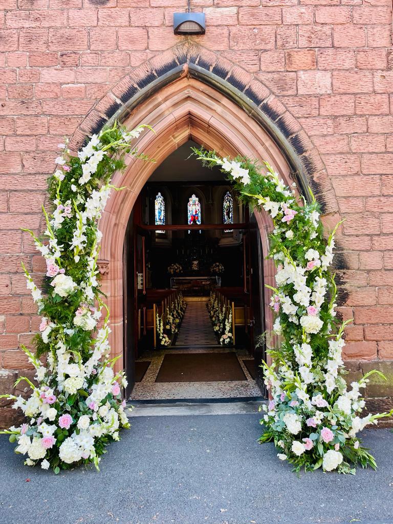 Pink and White Flower Arch at Bishop Eaton