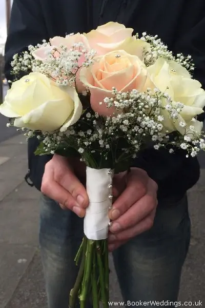 bridesmaid wedding bouquet pink and peach roses with gypsophila and diamantes handtied
