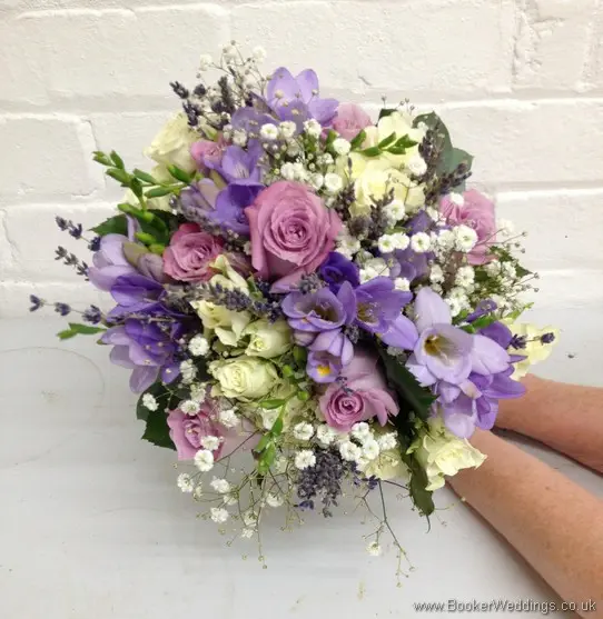 Just Picked but Neat Hand Tied Bridal Bouquet in Dusky Lilac and Gold with Lavender Roses, Lilac Freesia, Gypsophila, White spray roses, lavender