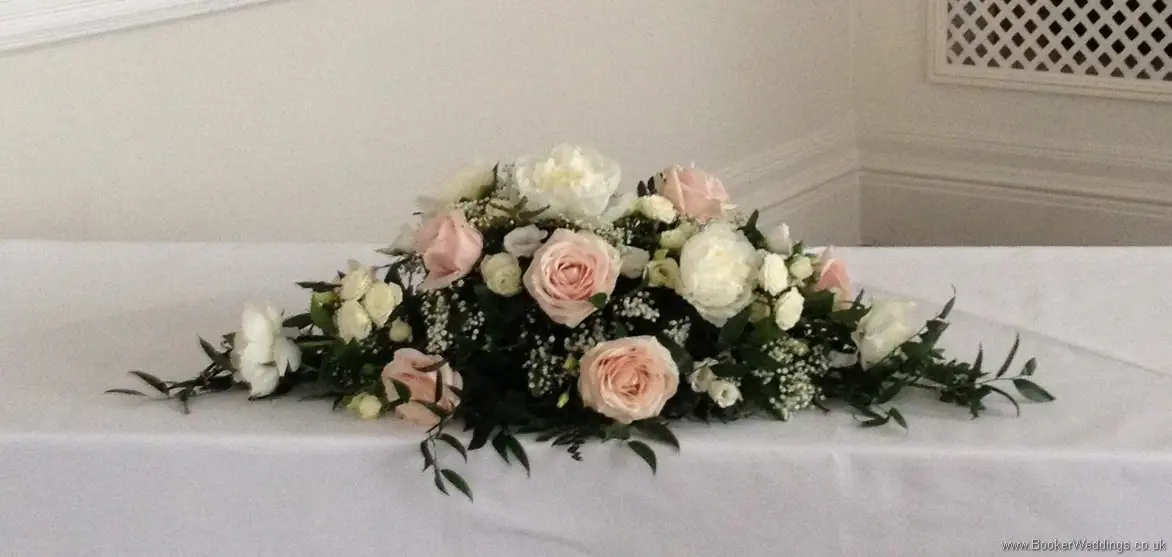 Top Table Arrangement in a Blush and Ivory Wedding Flower theme with peonies, roses, gypsy grass and lissianthus