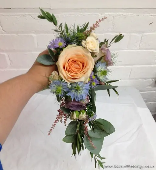 Wild garden flowers themed wedding flowers pin corsage with roses, spray roses, astilbe, lissianthus and nigella
