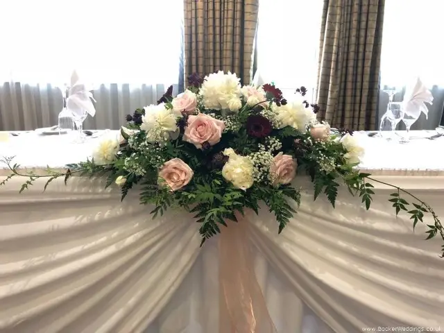 Pink White and Burgandy Top Table Arrangement for Wedding Reception