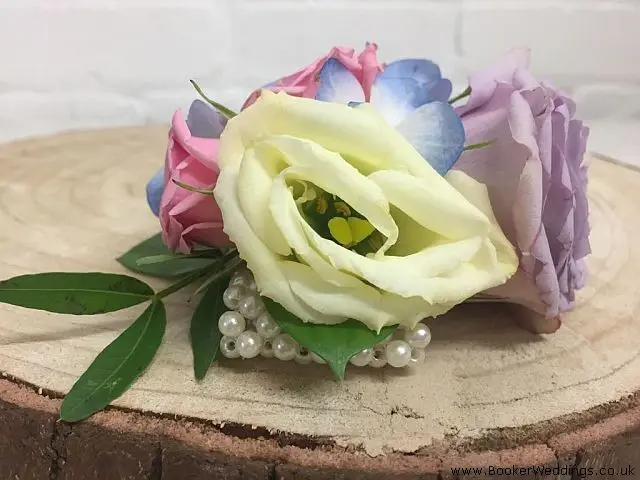 Wrist Corsage in Pastel Colours Using Roses
