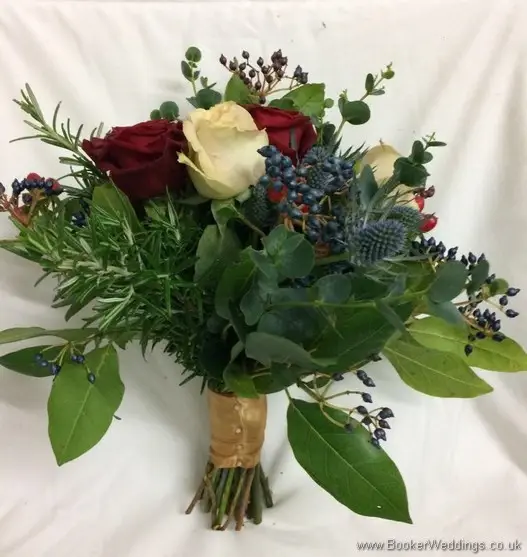 Christmas Wedding bridesmaid bouquet with roses, eryngium, viburnum berries, hypericum berries, rosemary & eucalyptus