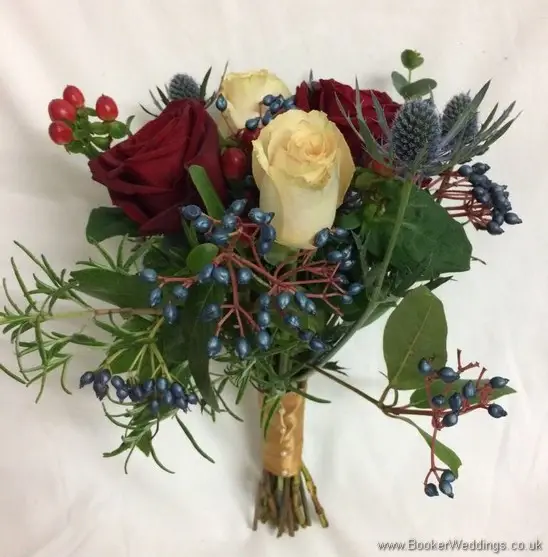 Winter Wedding bridesmaid bouquet with roses, eryngium, viburnum berries, hypericum berries, rosemary & eucalyptus