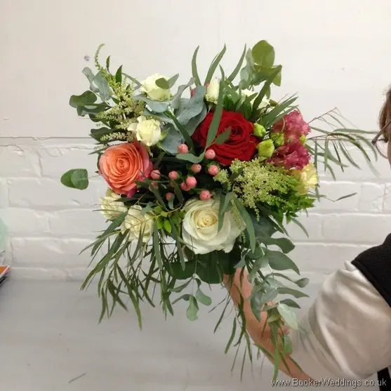 Cream, Coral and Burgundy Wild Flower and Foliage Hand Tied Bridesmaid Bouquet with Roses, Lissianthus, Hypericum berries, Astilbe and Eucalyptus