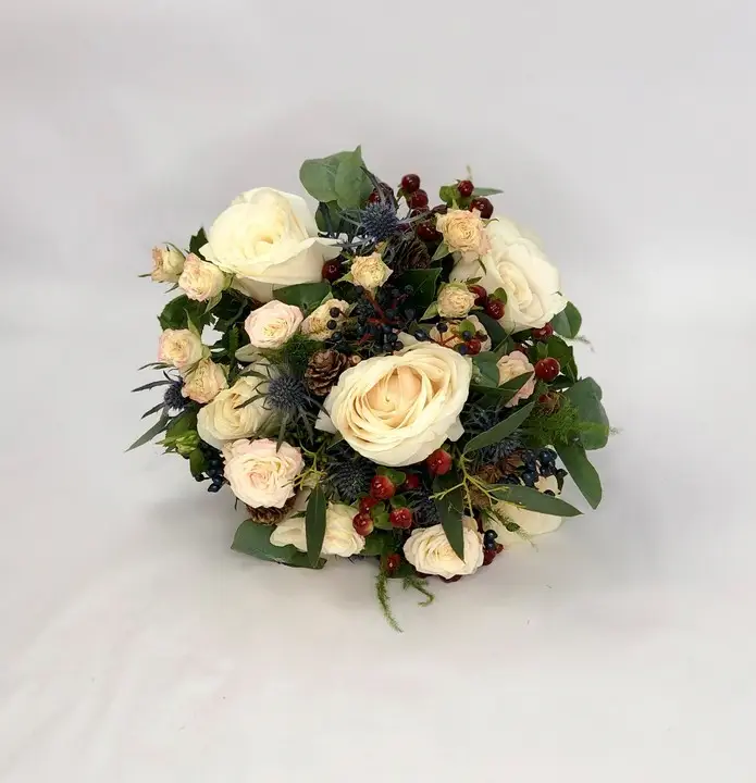 Compact Bridal Bouquet with Winter Textures in Peach and Blue