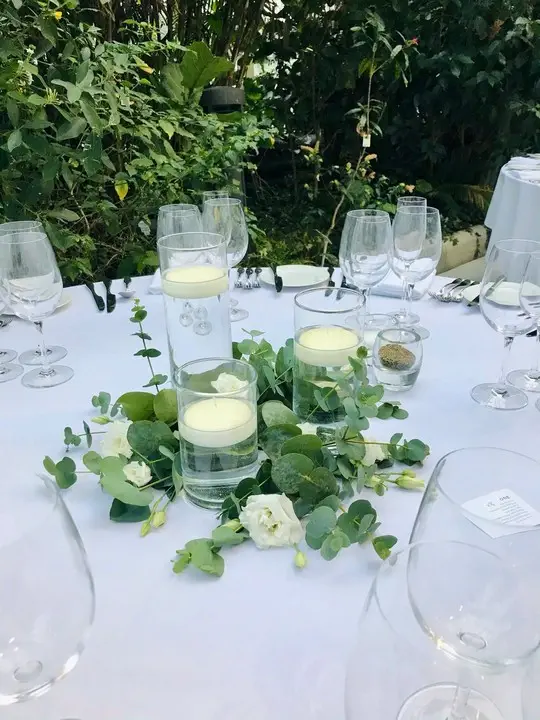Floating Candles Table Decoration with Eucalyptus and Lisianthus