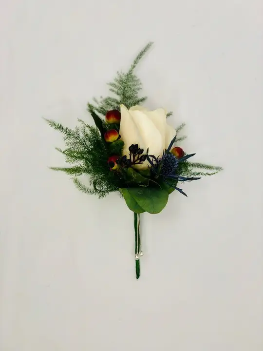 Wild Rose Boutonniere with Thistle and Berries