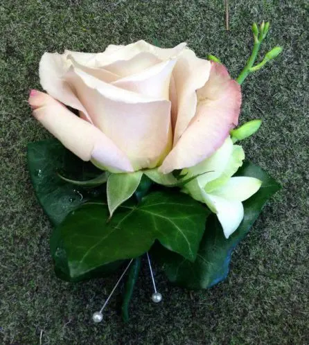 Quicksand Gold Rose and Dendrobium Orchhid Grooms Buttonhole