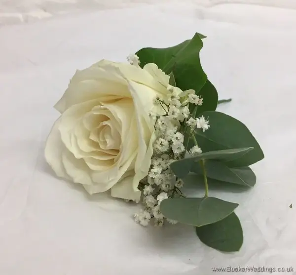 White rose, gypsophila and eucalyptus grooms buttonhole
