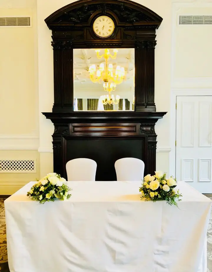 Registrar Table Flowers White Roses