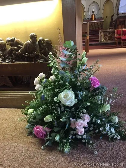 Wild just picked rustic altar arrangements at St Annes Church, Liverpool