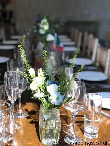 Rustic Wedding Flowers on Tables at Oh Me Oh My