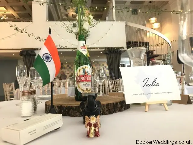 Rustic Wedding Table Flowers in Beer Bottles