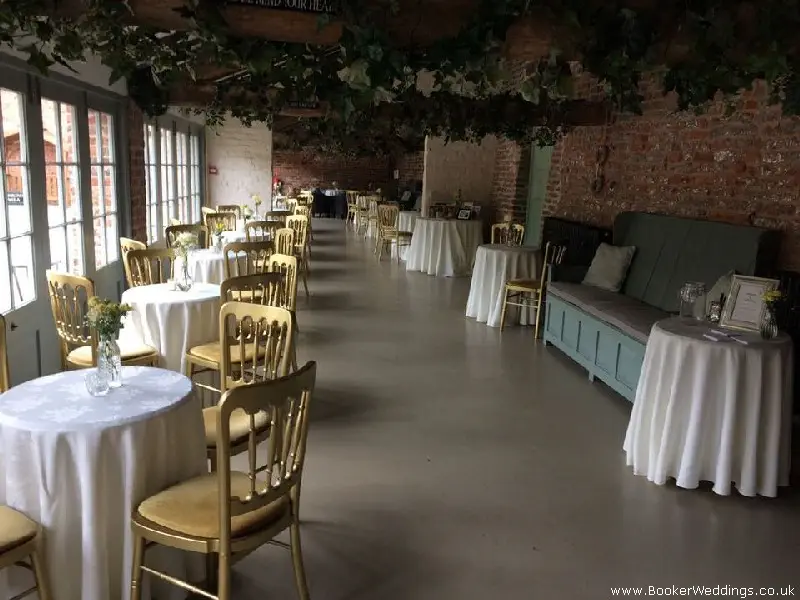 Meols Hall, Southport Wedding Venue, Flowers in glass jars on tables