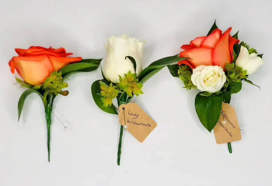Orange and White Rose Buttonholes