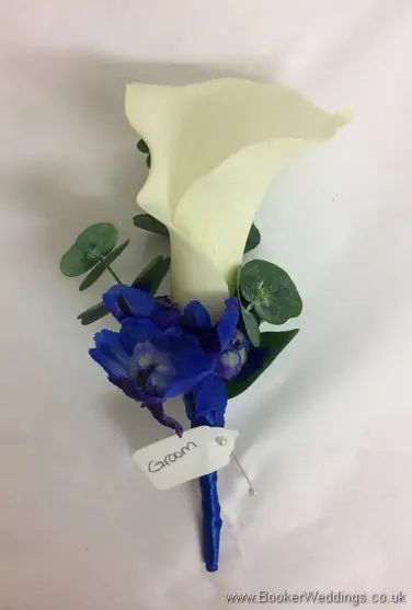 Grooms buttonhole with Calla Lily and blue flowers