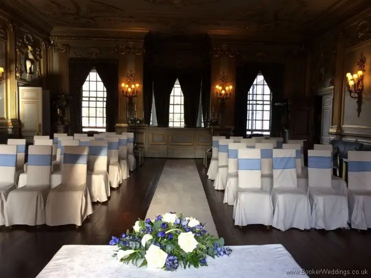 White and blue registrar table arrangement with calla lillies in Knowsley Hall