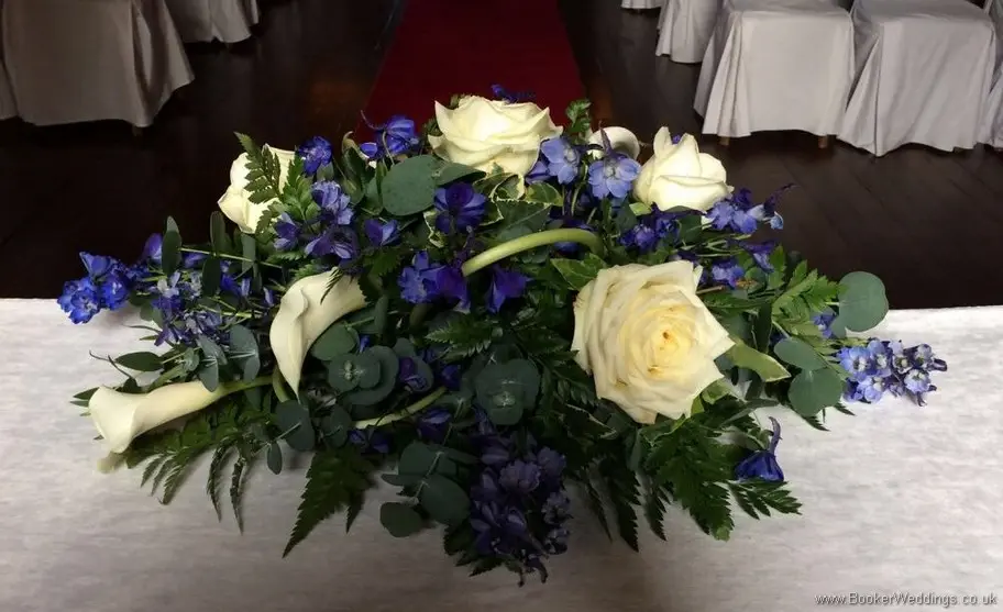 White and blue registrars table arrangement with calla lillies at Knowsley Hall