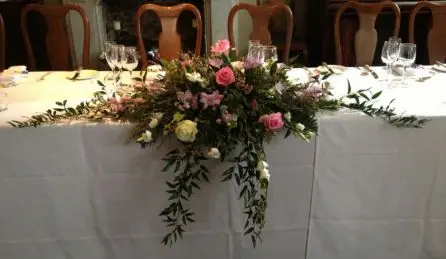Pink and Lilacs Long and Low Top Table Arrangement