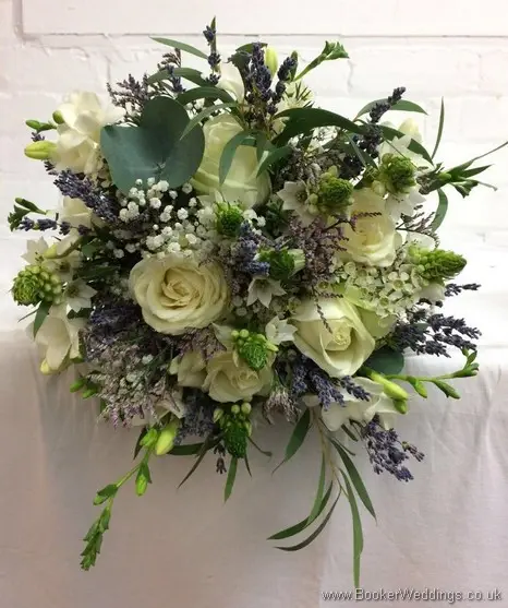 Semi-wild Bridal Bouquet with lots of texture, including roses, freesia, chinnies, lavender, gypsophila, wax flowers and eucalyptus
