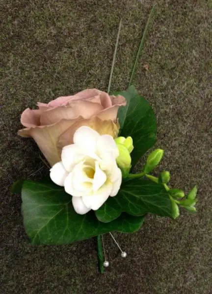 Brown Amnesia Rose and Freesia Grooms Buttonhole