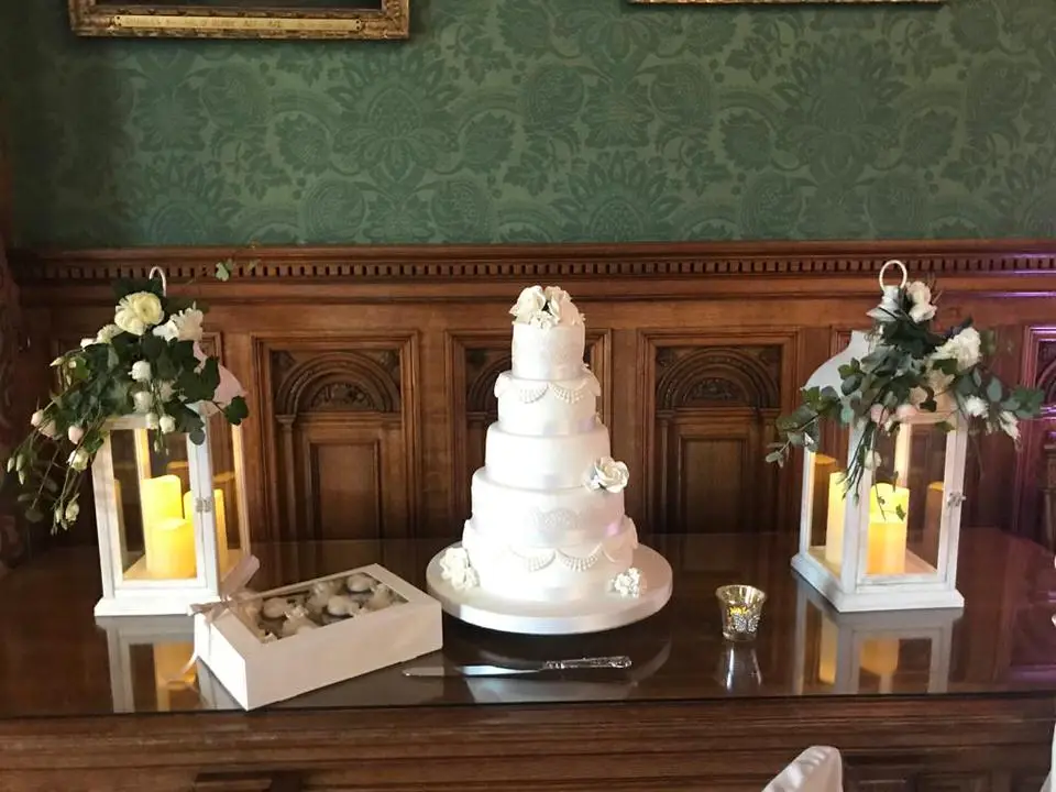 Cake Table Flowers and Lanterns