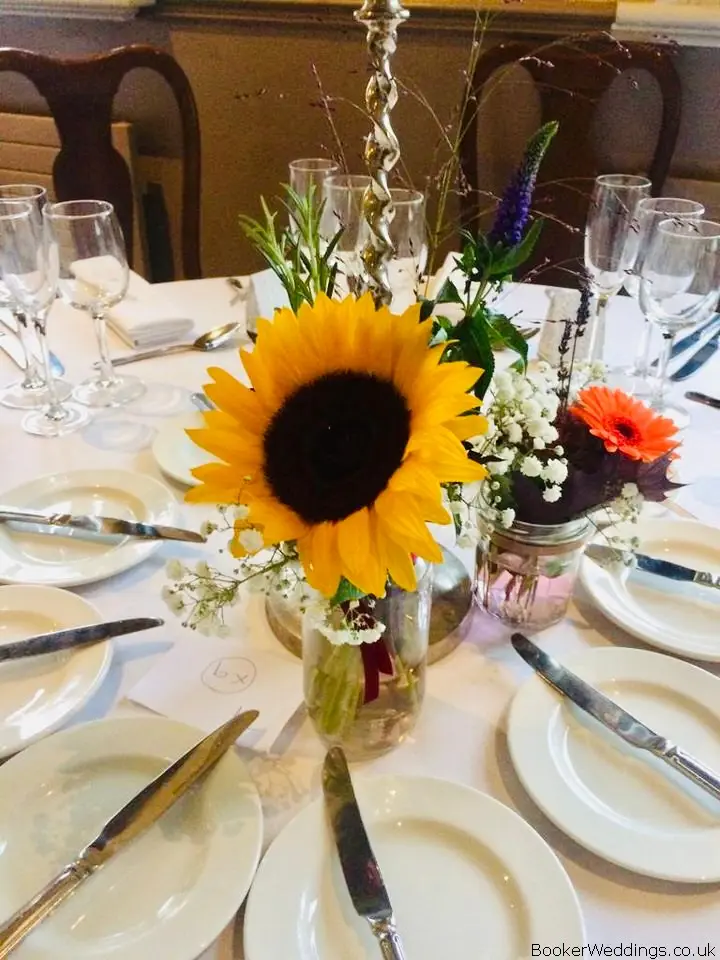 Sunflower and Gerbera in Glass Jars