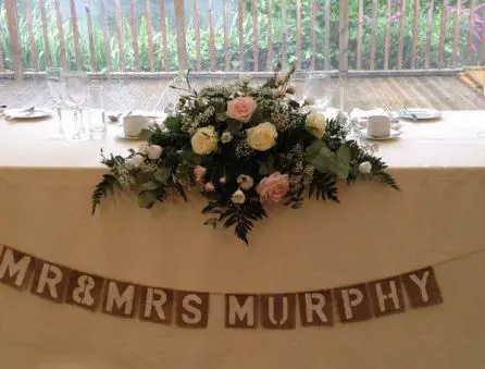 Pale Pink and Cream Rose Top Table Arrangement