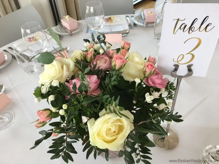 Semi-wild pale pink and cream Table Centrepieces with roses, ranunculus, bouvardia, spray roses and eucalyptus at Hope Street Hotel, Liverpool