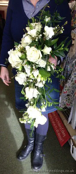 All White Hand-tied Bridal Shower Bouquet with Roses, Freesia and Waxflowers Side View