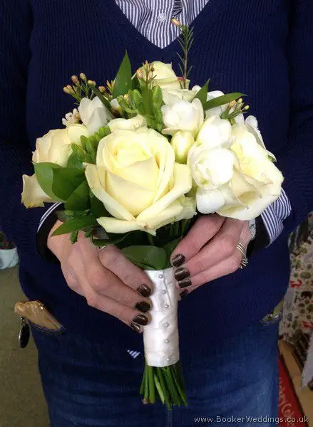 All White Hand-tied Bridesmaid Bouquet with Roses, Freesia and Waxflowers Side View