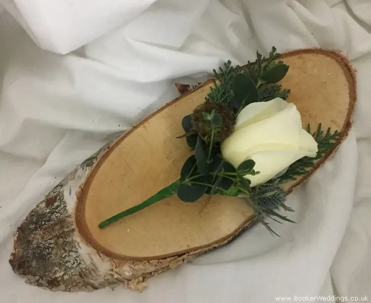 Winter Rustic Wedding ivory rose scabisoa and eryngium Groom fancy buttonhole