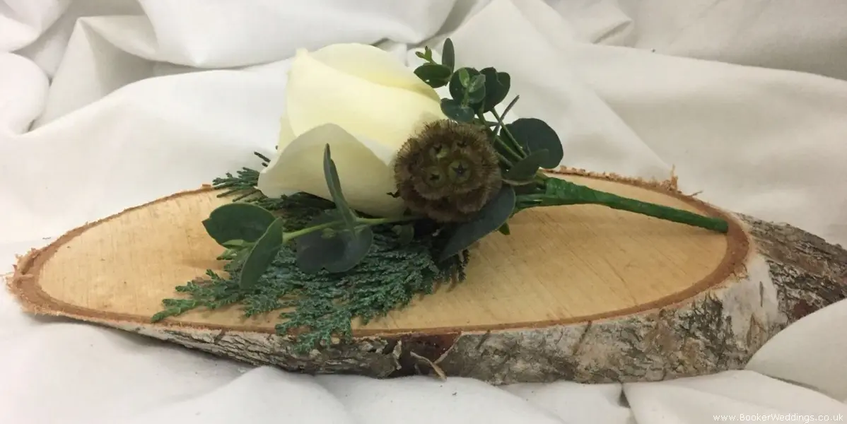 Winter Wedding rustic style Ivory rose scabisoa and eryngium groom fancy buttonhole
