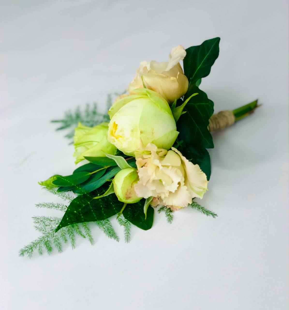 Pastel Rose and Lisianthus Boutonierre