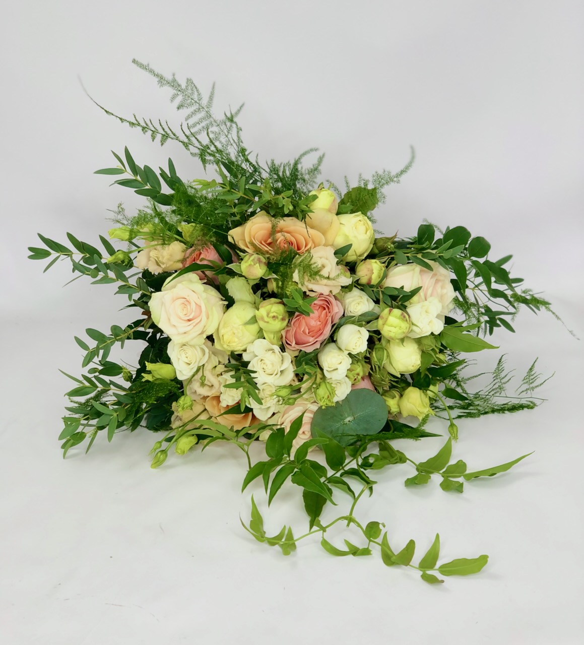 Pretty Pastel Mixed Rose Bridal Bouquet with Wild Foliage