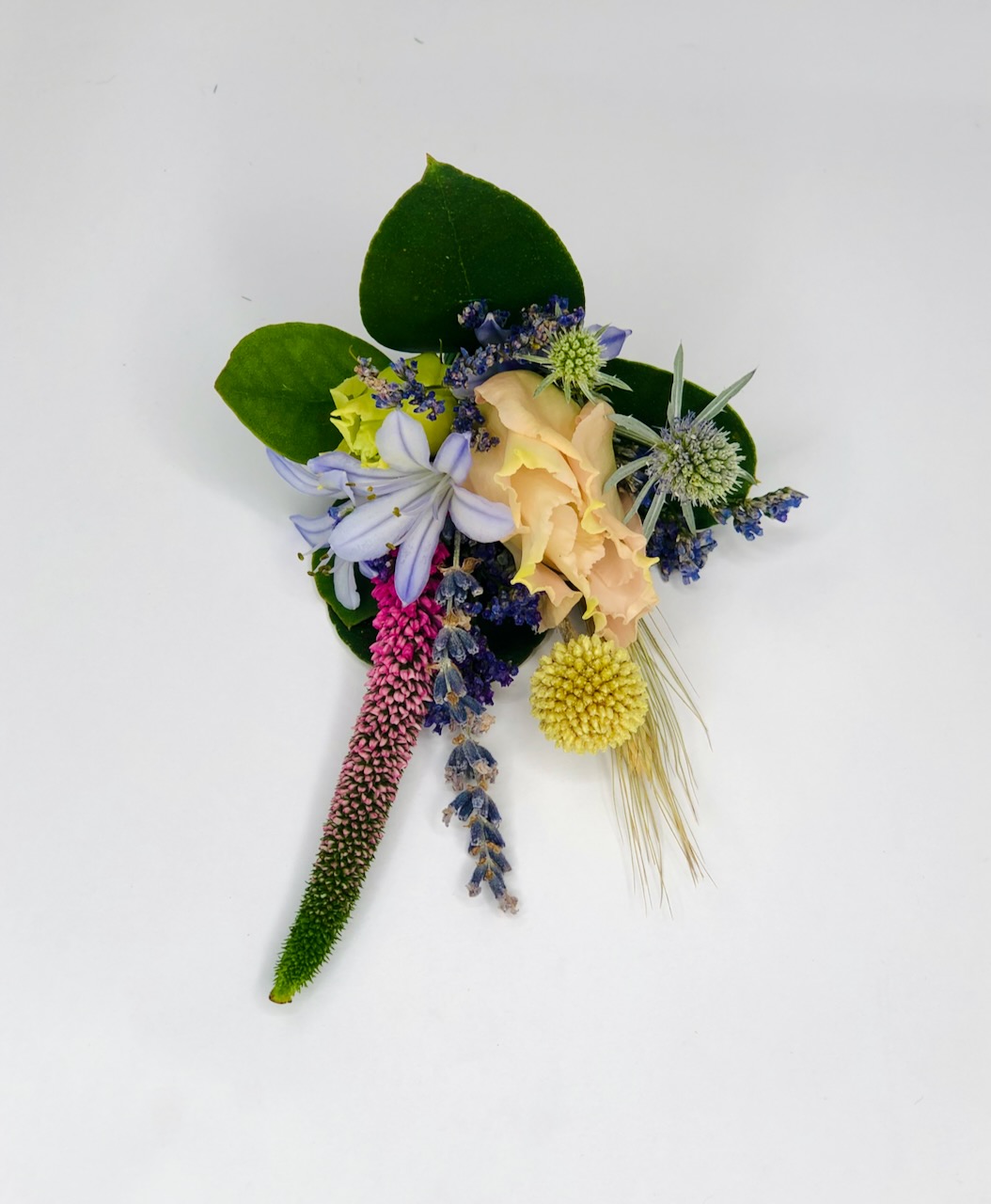 Summer Grooms Boutonierre with Delicate Flowers